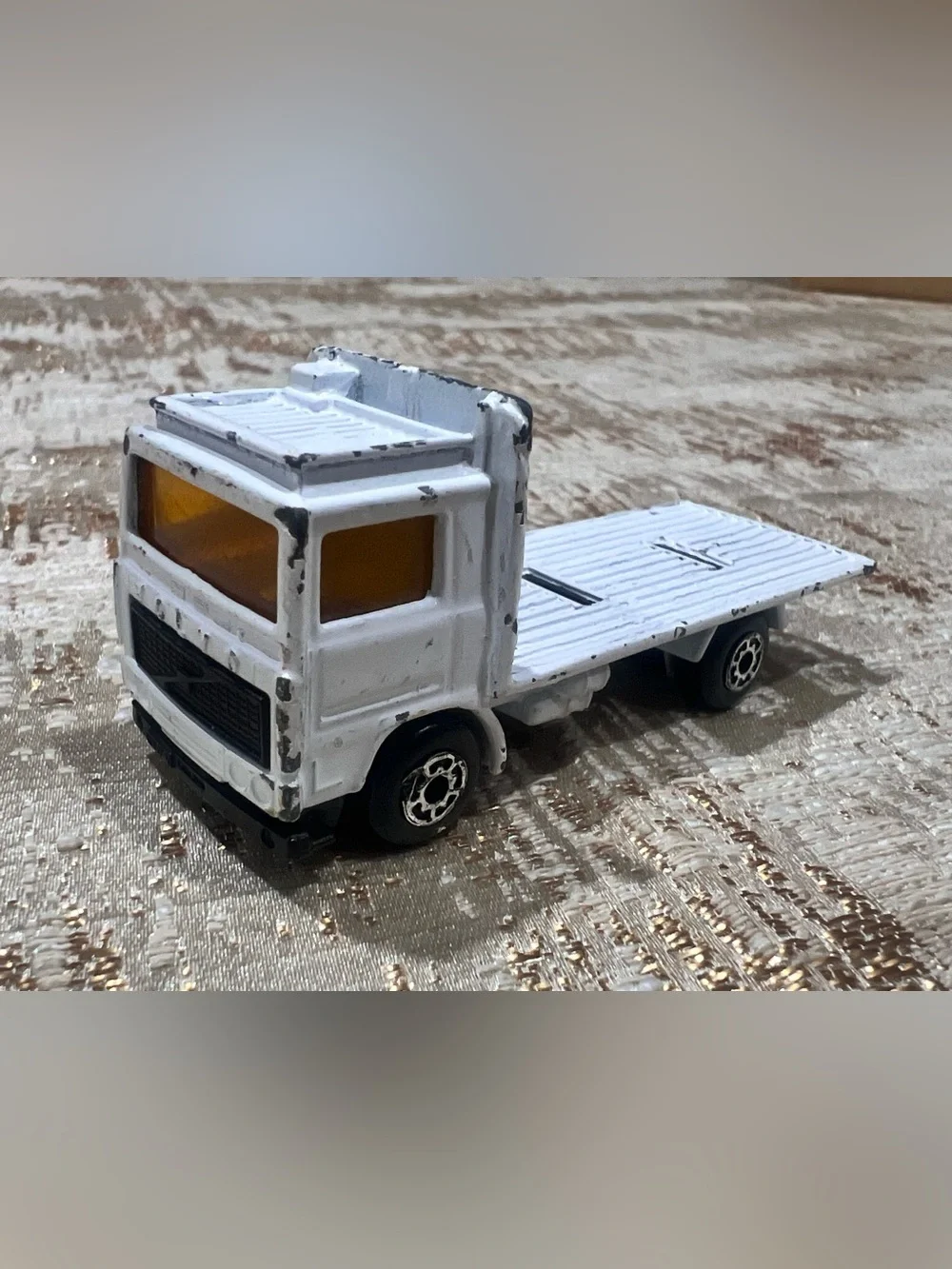 Vintage Matchbox 1981 White Volvo Flatbed Truck in used condition